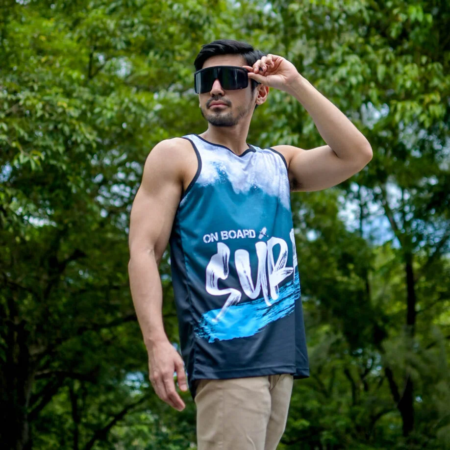Man wearing a customized tank top outdoors